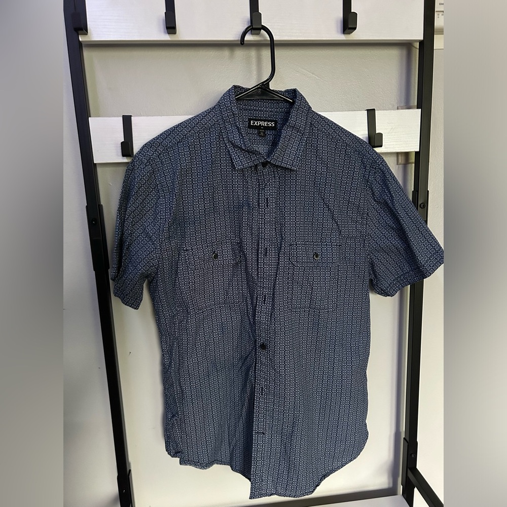Navy blue and white button up collared shirt